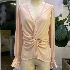 Mauve dress top size small with beaded details at the sleeves